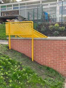 Stairs with yellow bespoke balustrade