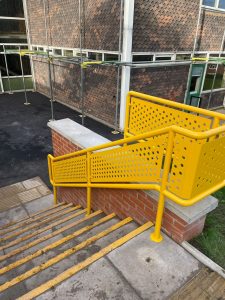 Stairs with yellow bespoke balustrade